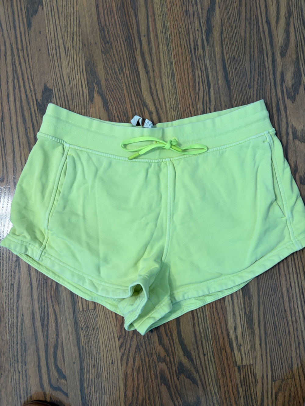 Lululemon Inner Glow 3 inch neon yellow shorts